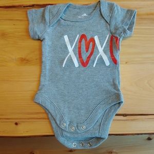 Newborn bodysuit, brand new never worn.